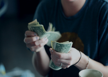 Woman hands, counting money