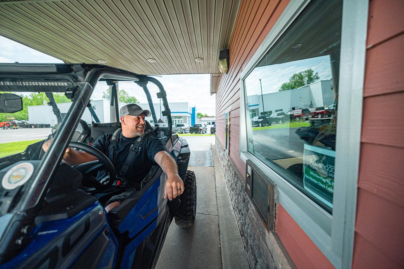 Member using the drive-thru banking at the Potsdam branch