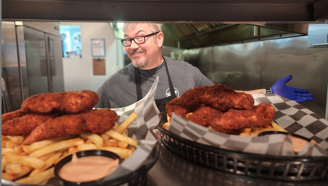 Derek William The Airport Dinner Serving up Food