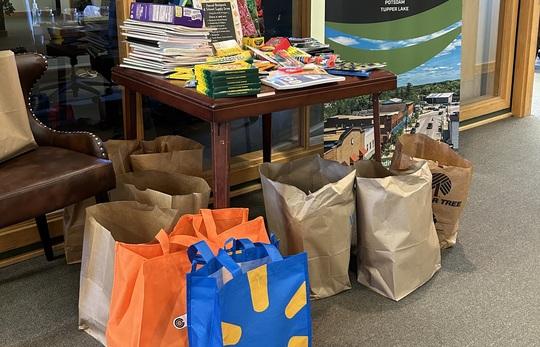 donations generated from the local community to support the annual school supply drive by Adirondack Regional Federal Credit Union