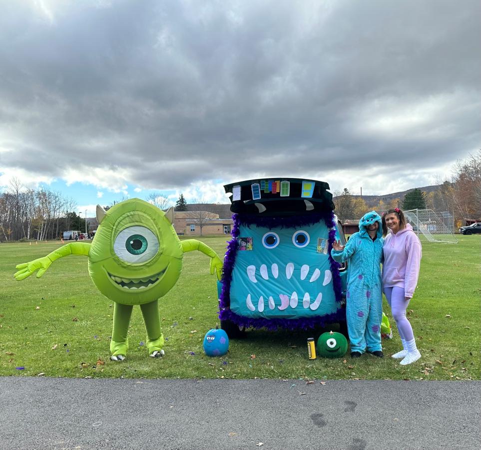 Adirondack Regional FCU Staff in costumer at trick or treating event.