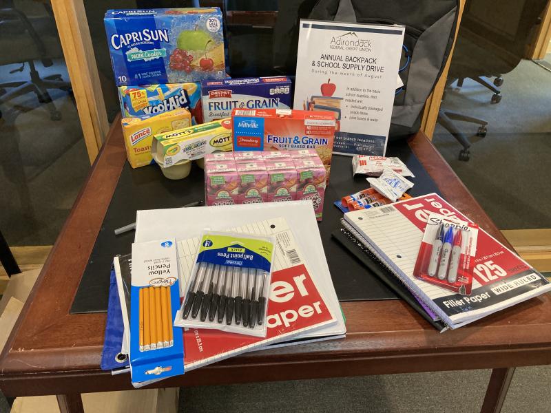school supply donations being collected by Adirondack Regional Federal Credit Union to help local students in need. 