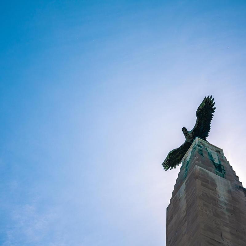 View from under a bronze eagle statue