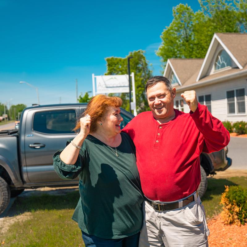 ARFCU Staff member with a happy member & their new truck.